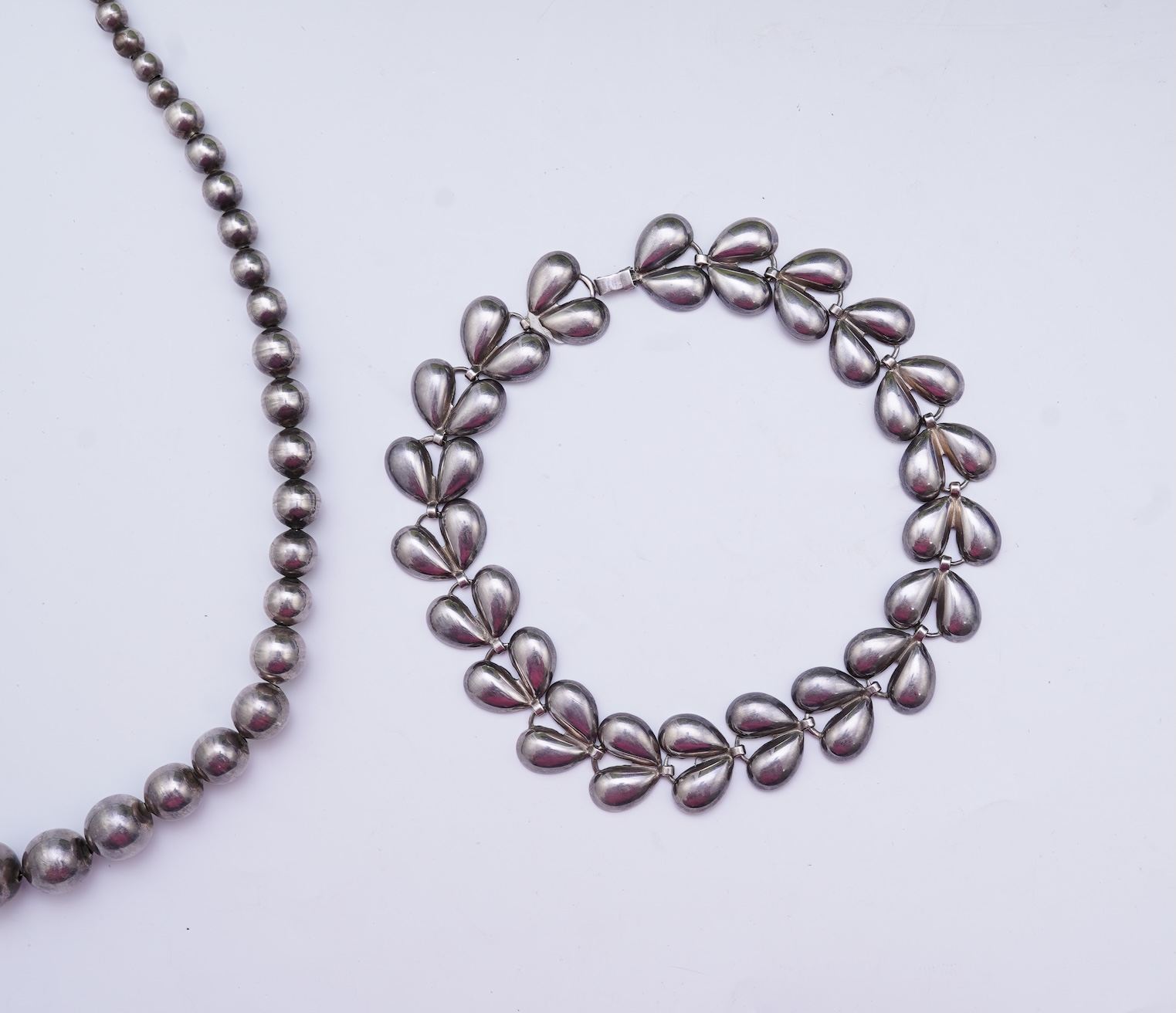 Two silver necklaces